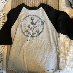 Reef baseball tee (3/4 sleeve). Worn a few times. Fits normal as large.